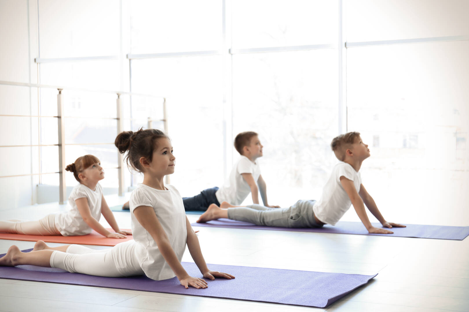 Little,Children,Practicing,Yoga,In,Gym